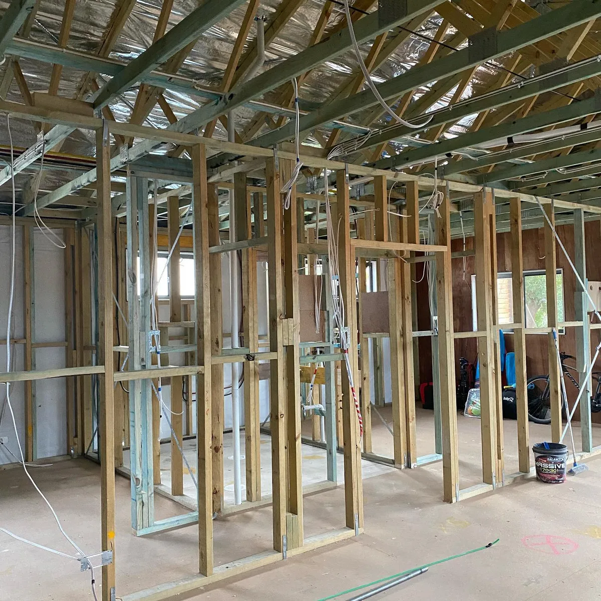 Timber and steel wall framing inside a renovation