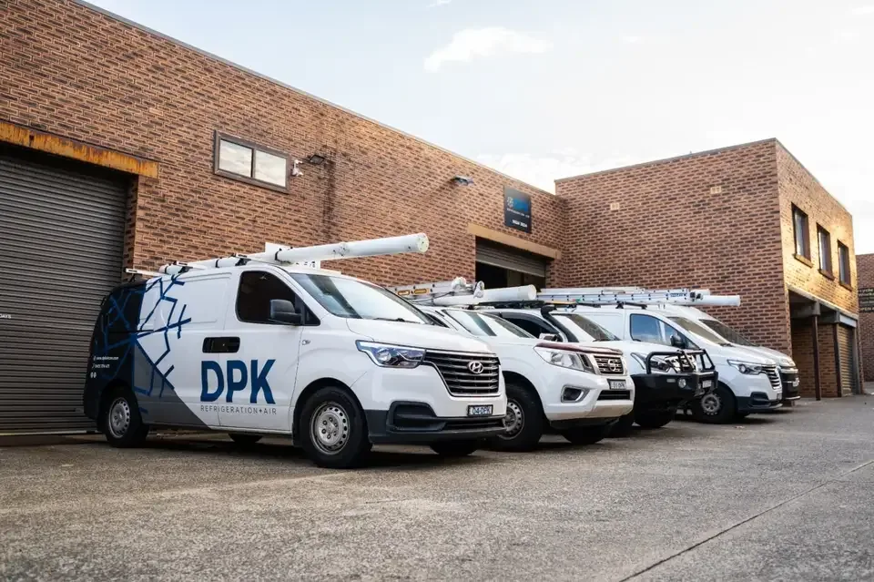 The DPK Refrigeration and Air fleet lined up outside the premises