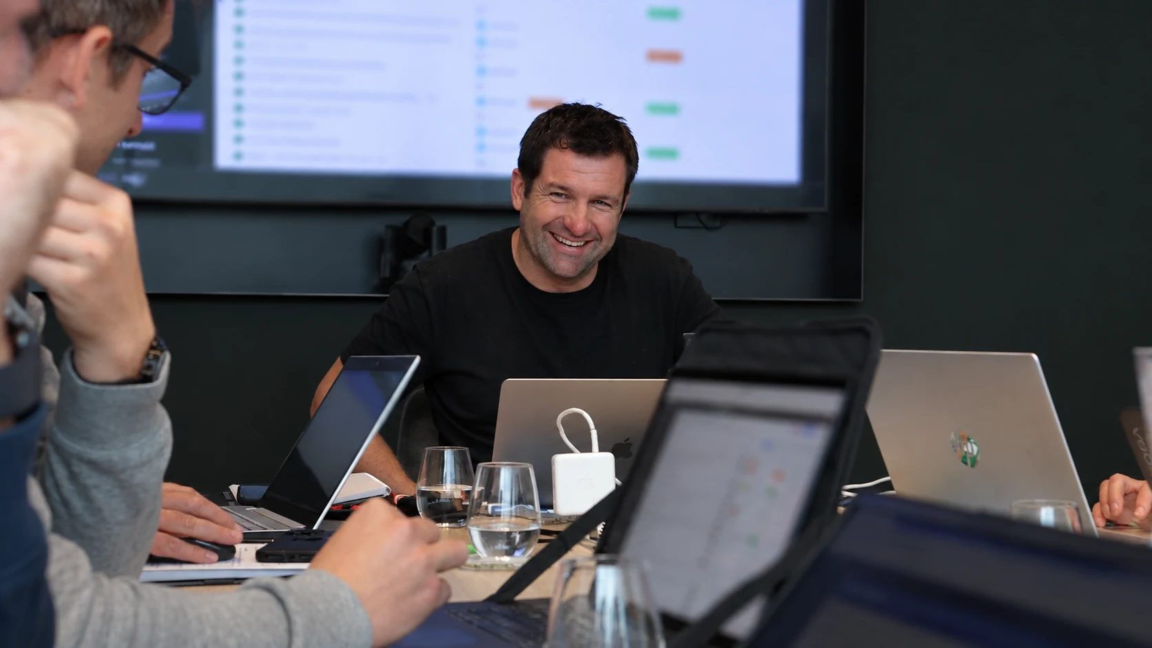 Andrew with business owners around the table