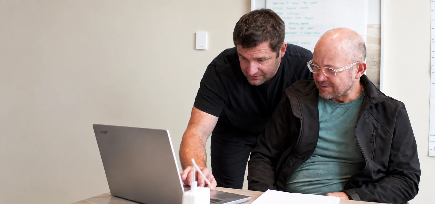 Andrew helping a business owner work through a plan
