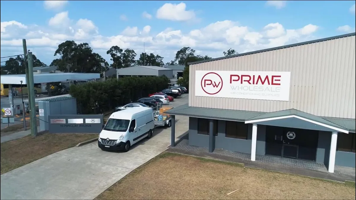The Prime Wholesale premises and signage, a van parked out front