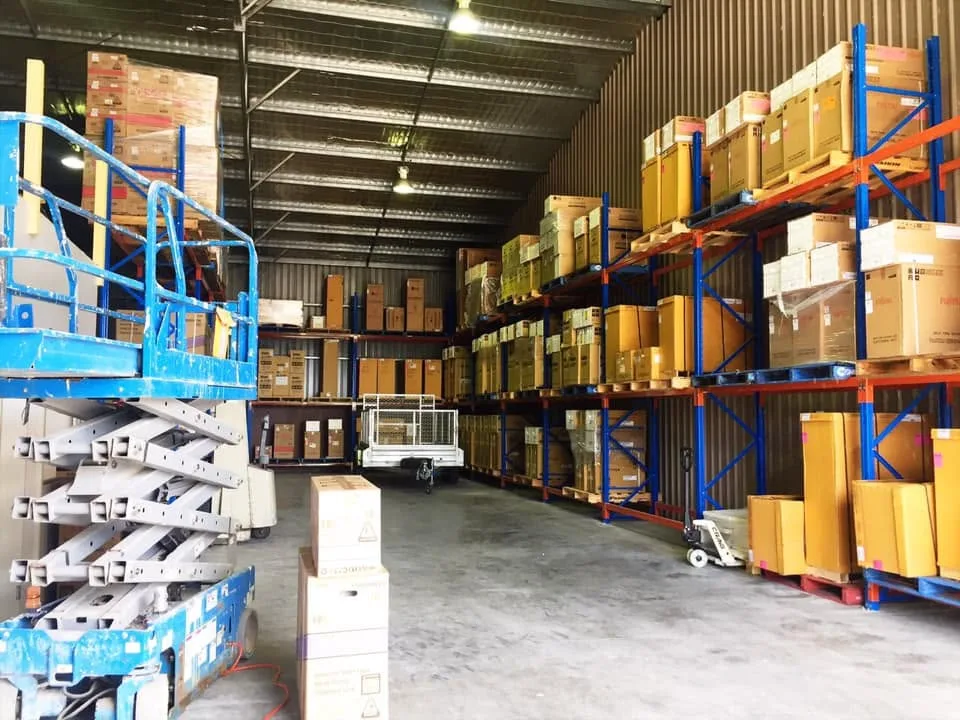 Boxed stock on pallet racking inside the warehouse
