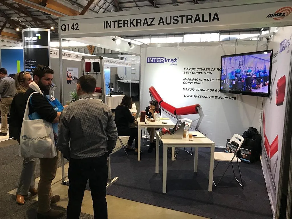 Visitors at the Interkraz Australia stand at a trade show